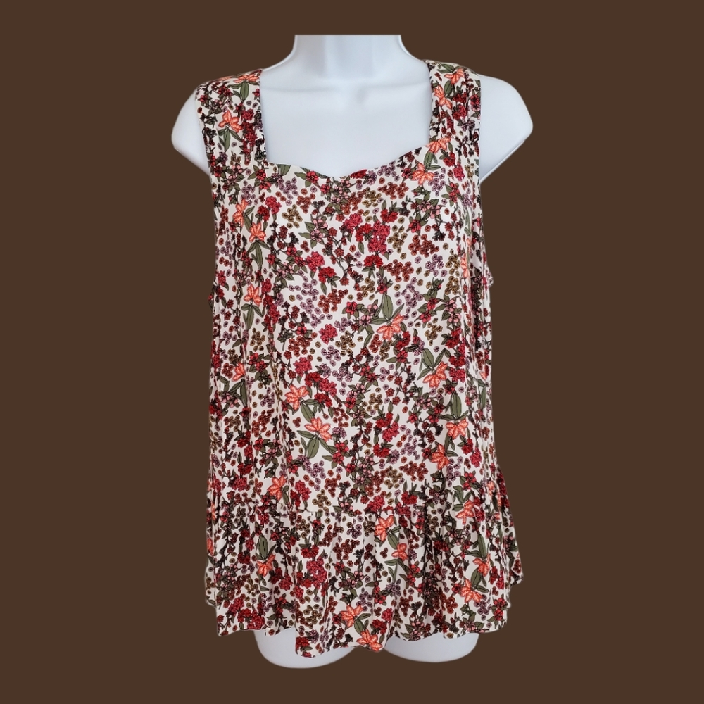 Ann Taylor Loft sleeveless peplum blouse, size medium, white with floral pattern